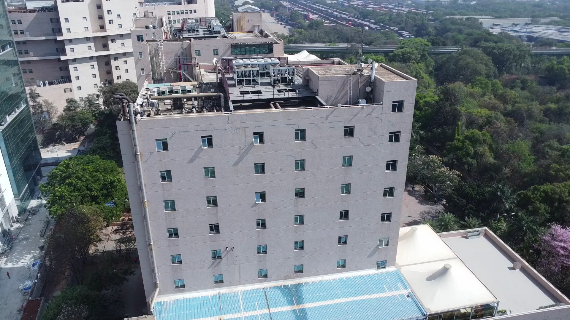Drone capturing thermal data of a skyscraper